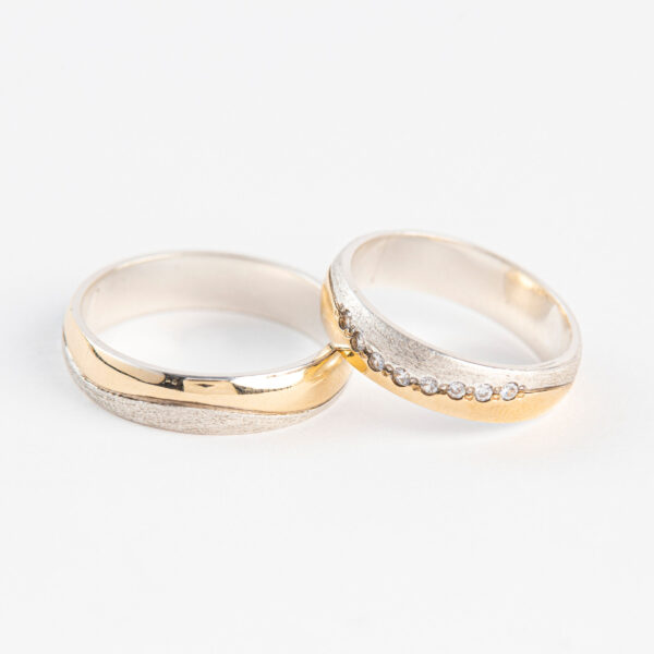Argollas estilo ola de plata con oro