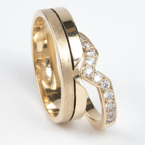 Argollas de matrimonio Maravilla en oro 18K encajadas formando una sola pieza