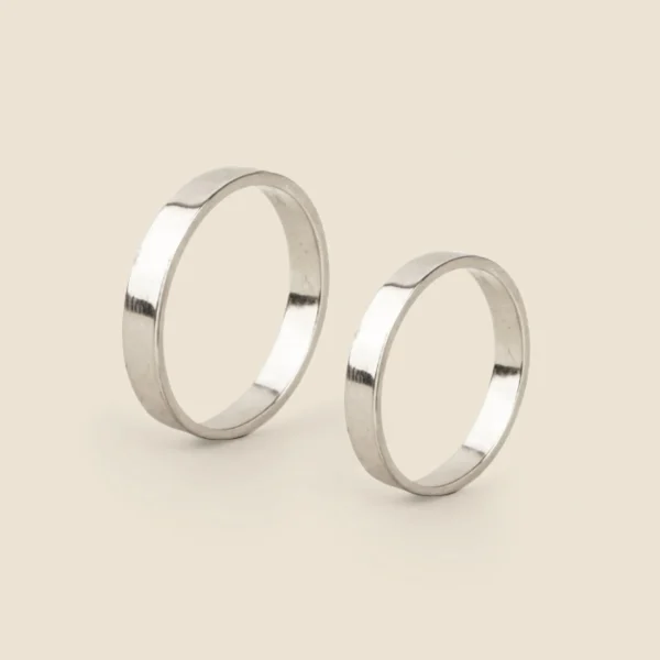 Argollas de matrimonio planas en oro blanco 18K, par de caras rectas