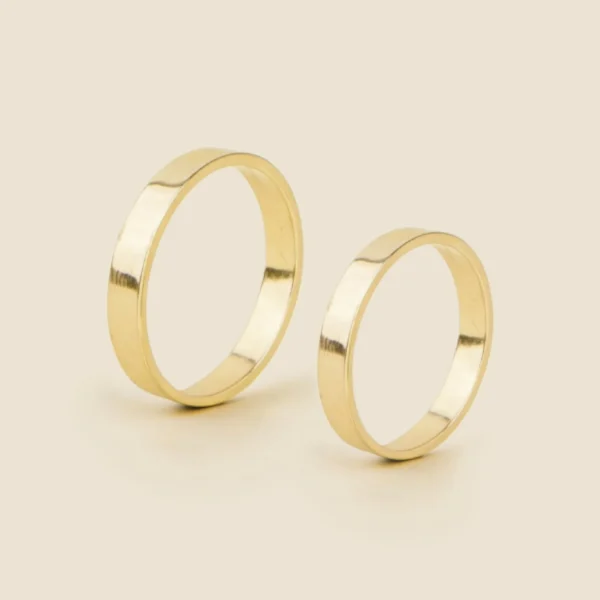 Argollas de matrimonio planas en oro amarillo 18K, par de caras rectas